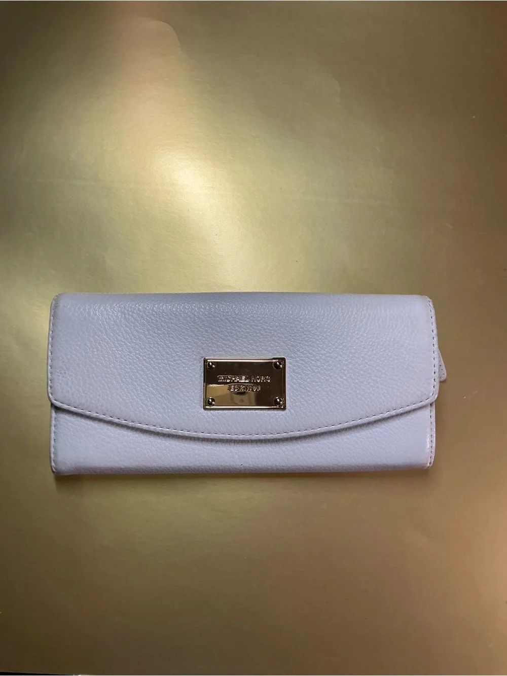 Michael Kors previously owned